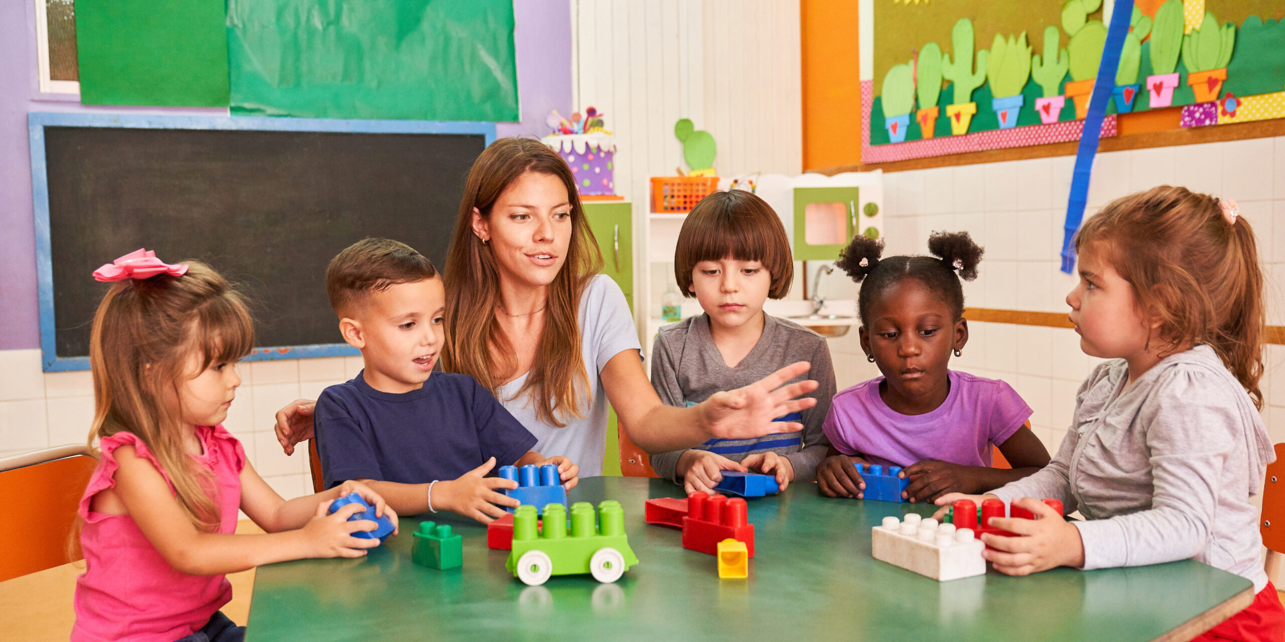 Group,Of,Children,Plays,With,Colorful,Building,Blocks,In,The Children at Soans Christian Academy Christian daycare